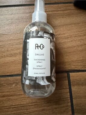 R+Co Dallas Thickening Spray in Clear Bottle with White Label